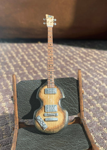 GUITAR:   P.M. LH Hofner bass